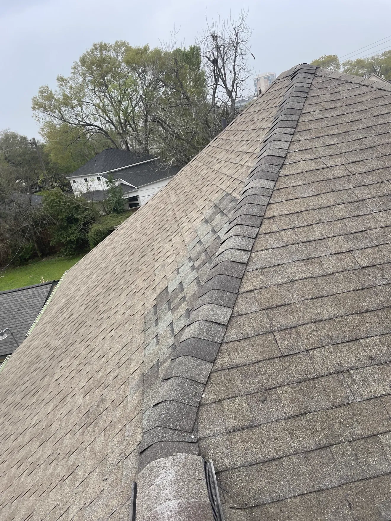 New hip ridge on a completed shingle roof replacement